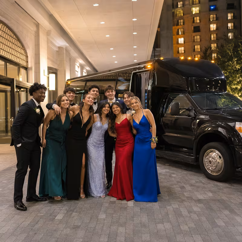 Party bus interior with wraparound leather seating and LED lighting in Minneapolis
