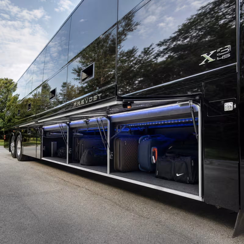 Party bus interior with wraparound leather seating and LED lighting in Minneapolis