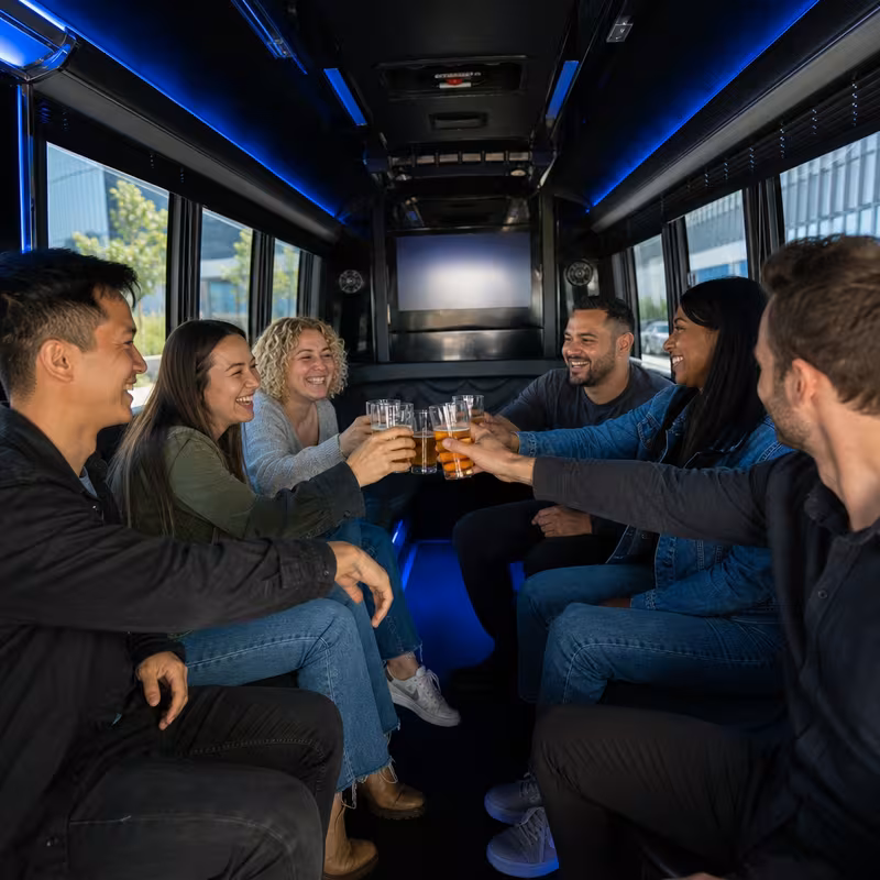 Group boarding a white charter bus for Winery & Brewery Tour Transportation transportation in Minneapolis